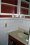 Old tile, sink and shelves