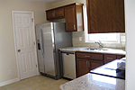 New cabinets, countertops, flooring, tile backsplash and appliances